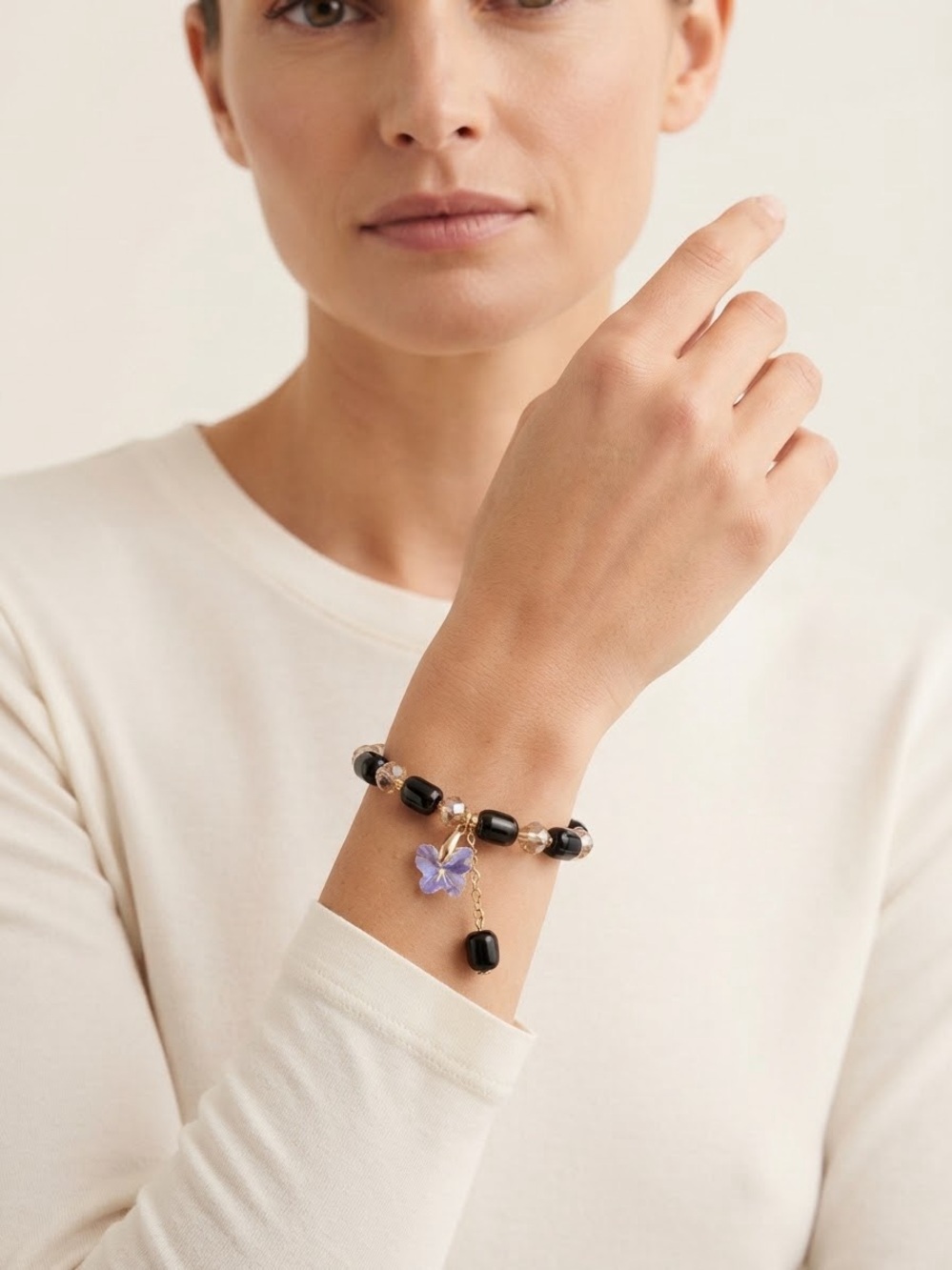 Elegant Black and Clear Beaded Bracelet with Flower Charm